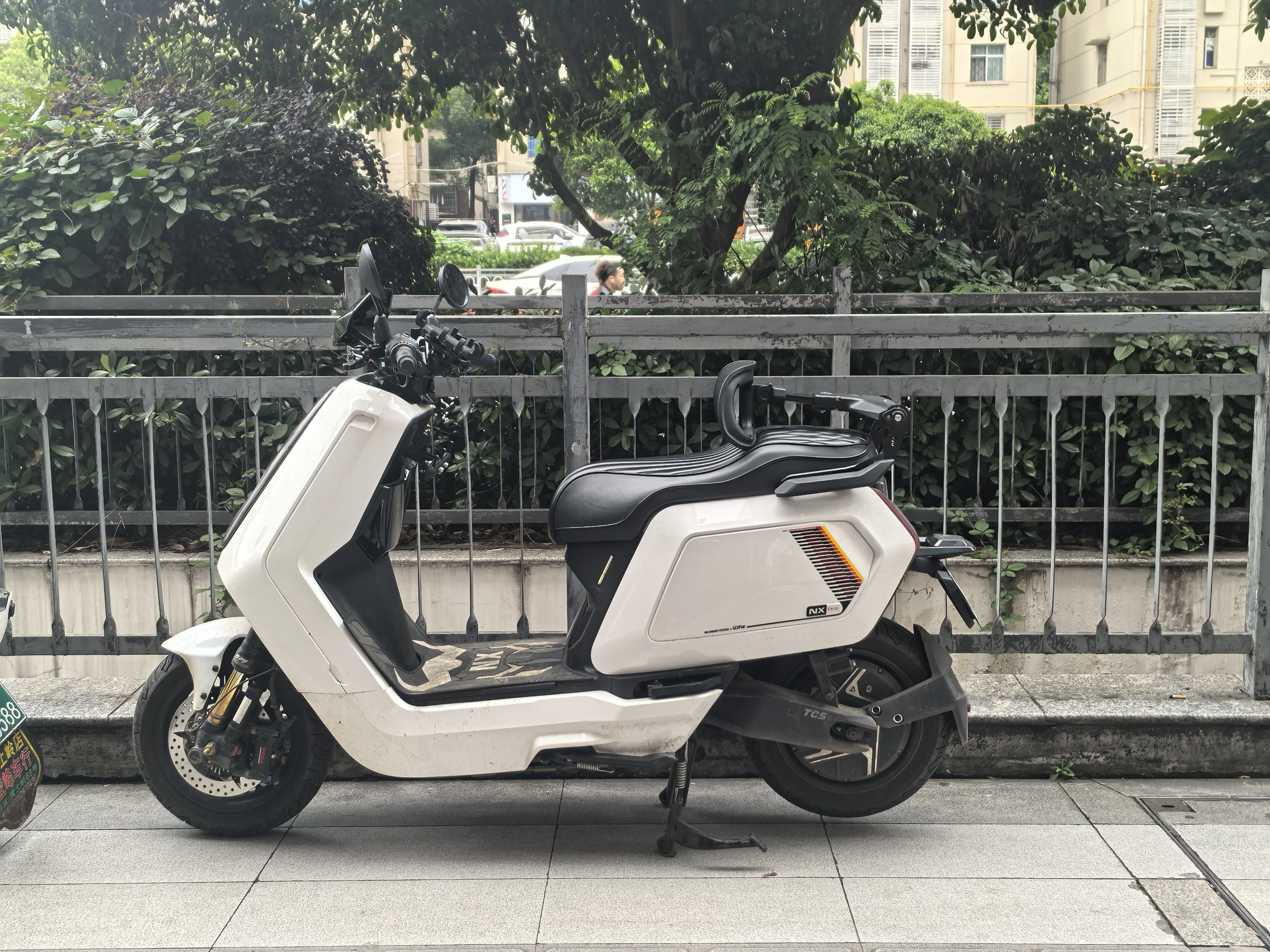 A scooter fitted with the TUBAN adjustable backrest system
