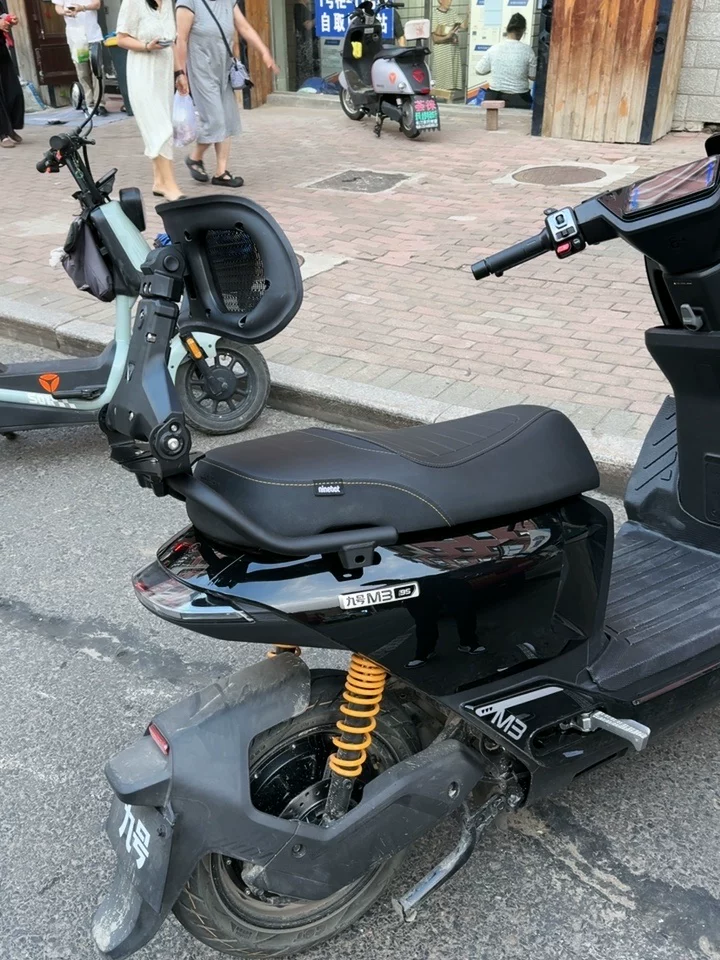 Close view of TUBAN installed behind a scooter seat